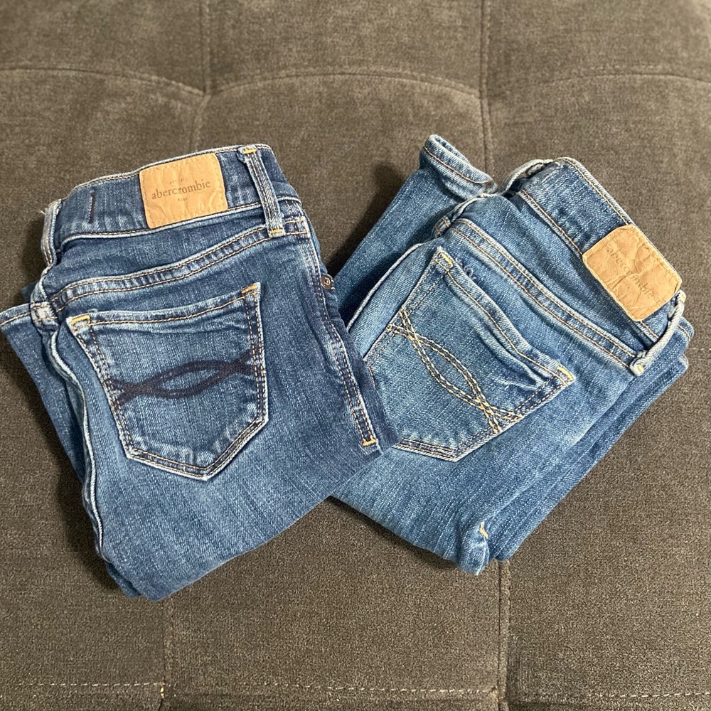 2 pair of Girls size 8 Abercrombie boot cut jeans.